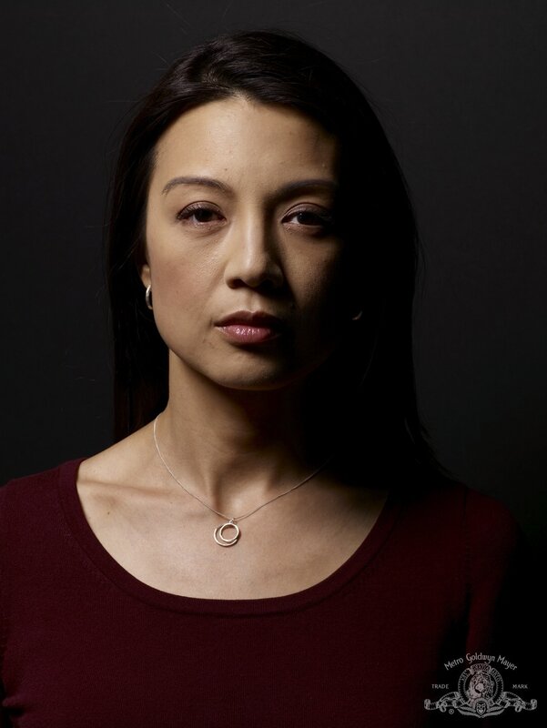 woman in maroon shirt