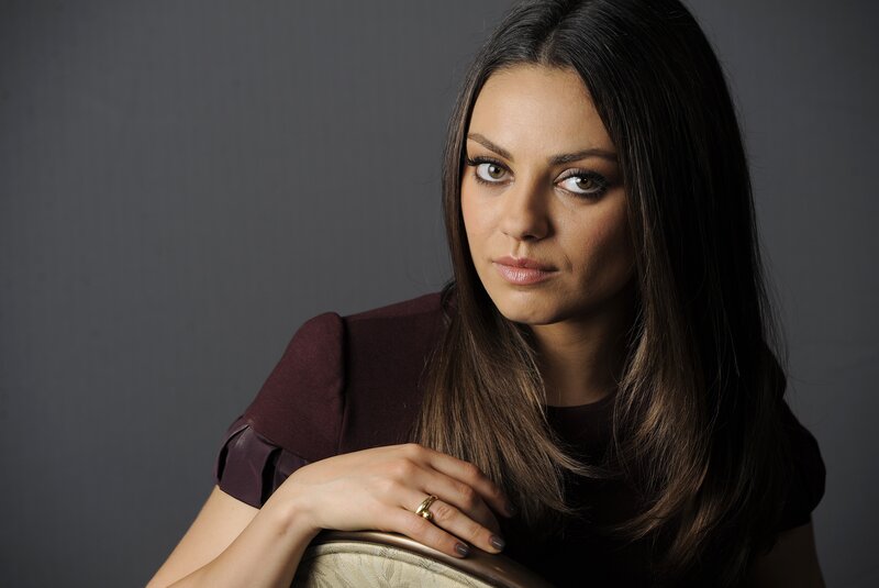 woman in maroon top