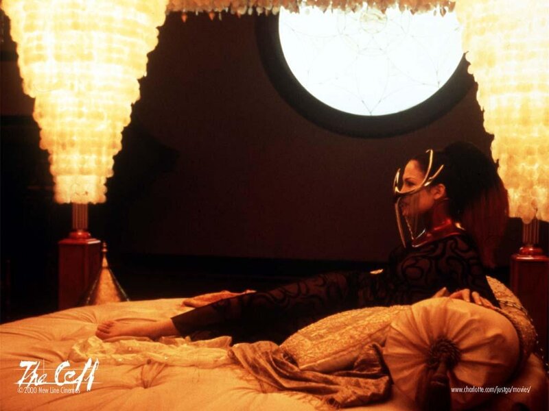 Woman in Mask on Bed