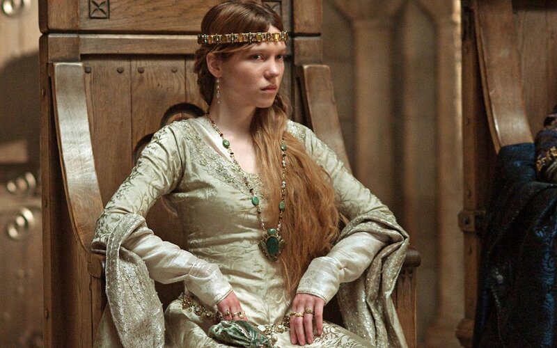 woman in medieval dress sitting