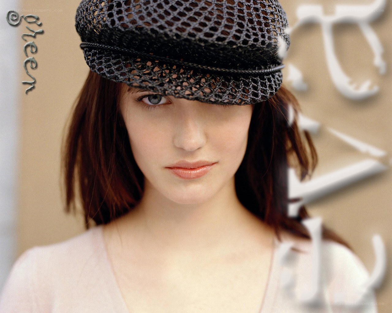 woman in mesh hat