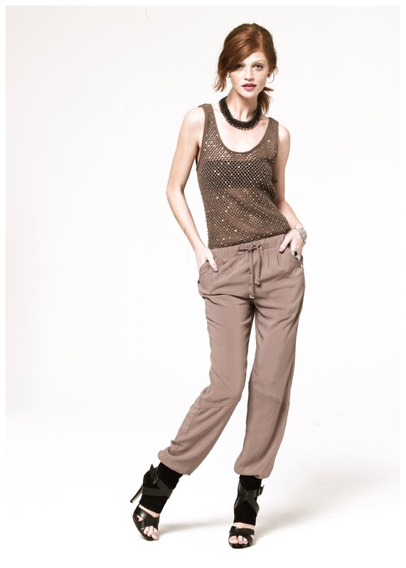 woman in mesh top and trousers