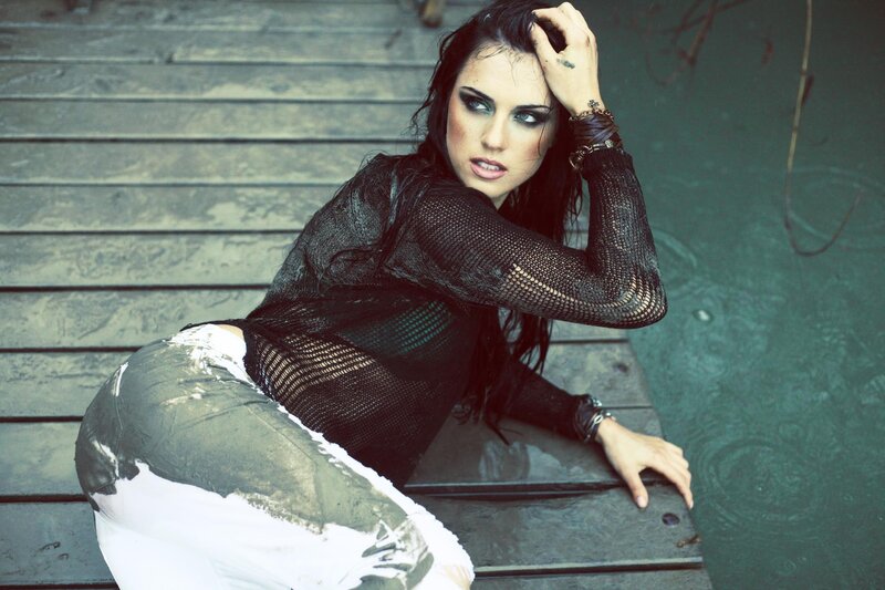 woman in mesh top on dock