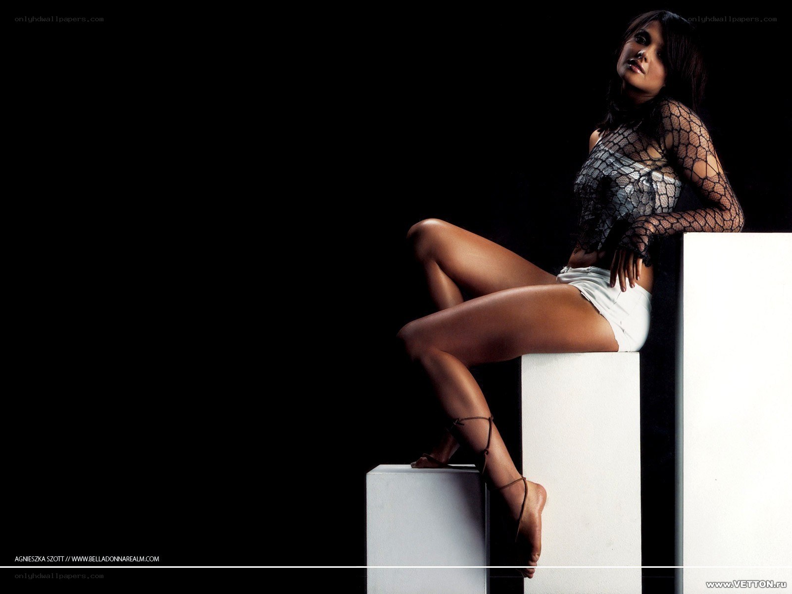 woman in mesh top posing