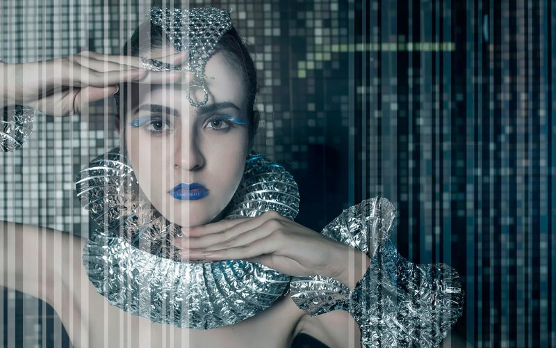 Woman in Metallic Costume — Silver, Dramatic