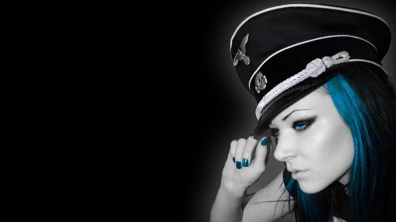 woman in military hat with blue hair