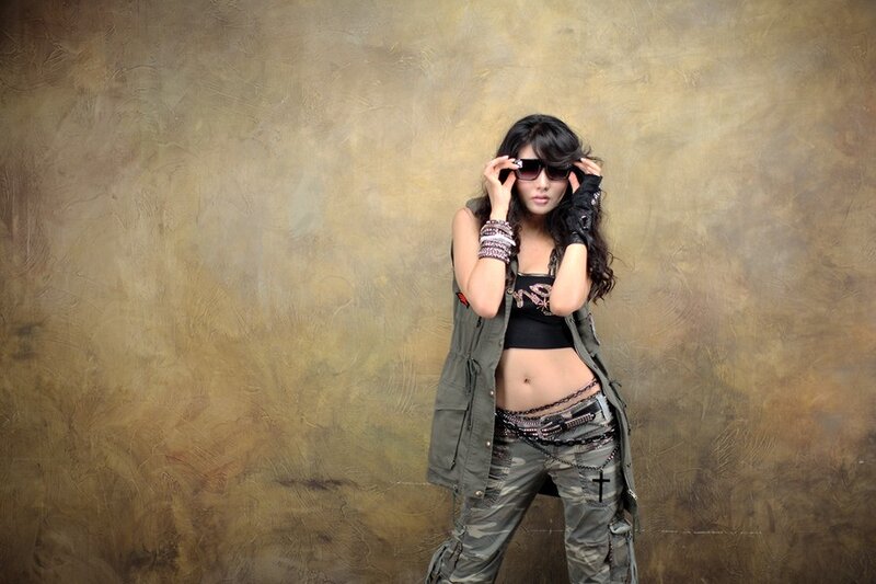 Woman in Military-style Clothing — Brown, Confident