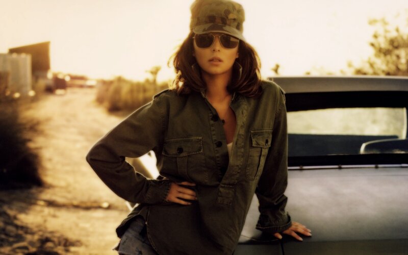 Woman in Military-style Clothing — Green, Dramatic, Sunset