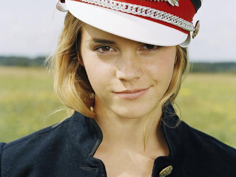 woman in military-style hat