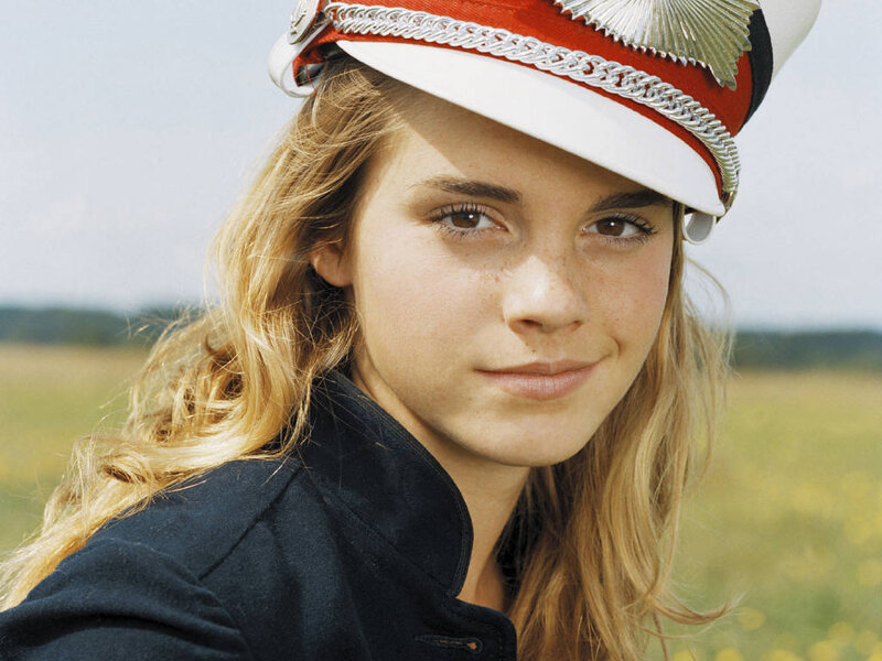 woman in military-style hat