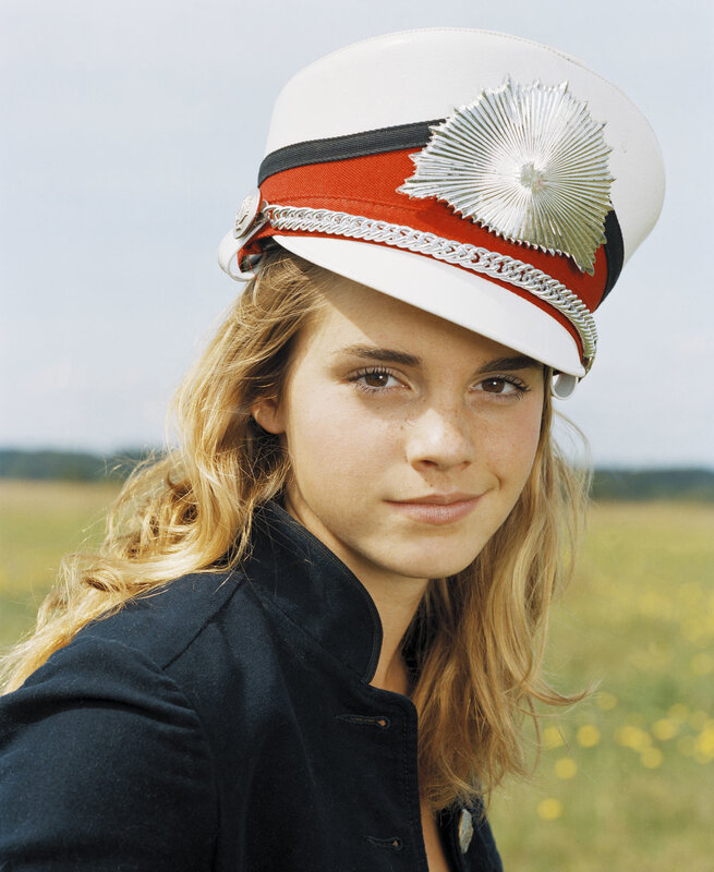 woman in military-style hat
