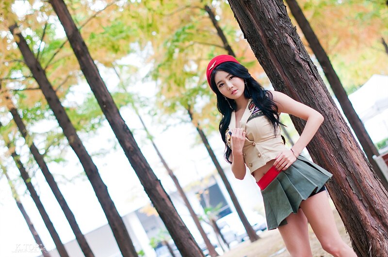 Woman in Military-style Outfit — Green, Calm