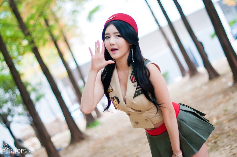 Woman in Military-style Outfit — Green, Playful