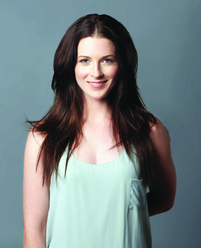 woman in mint green top
