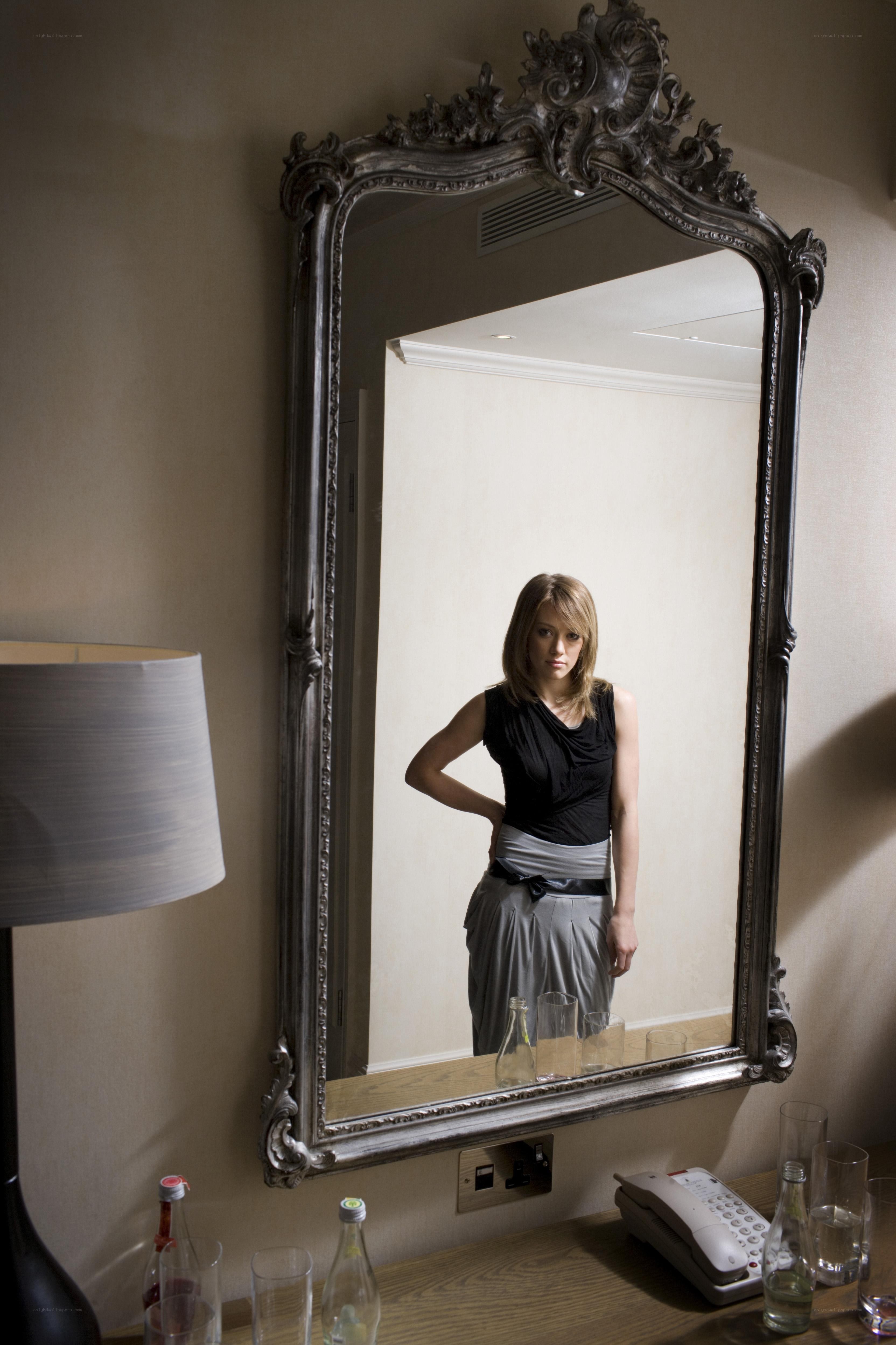 Woman in mirror reflection