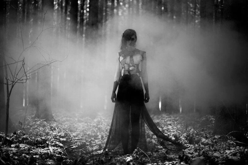 woman in misty forest