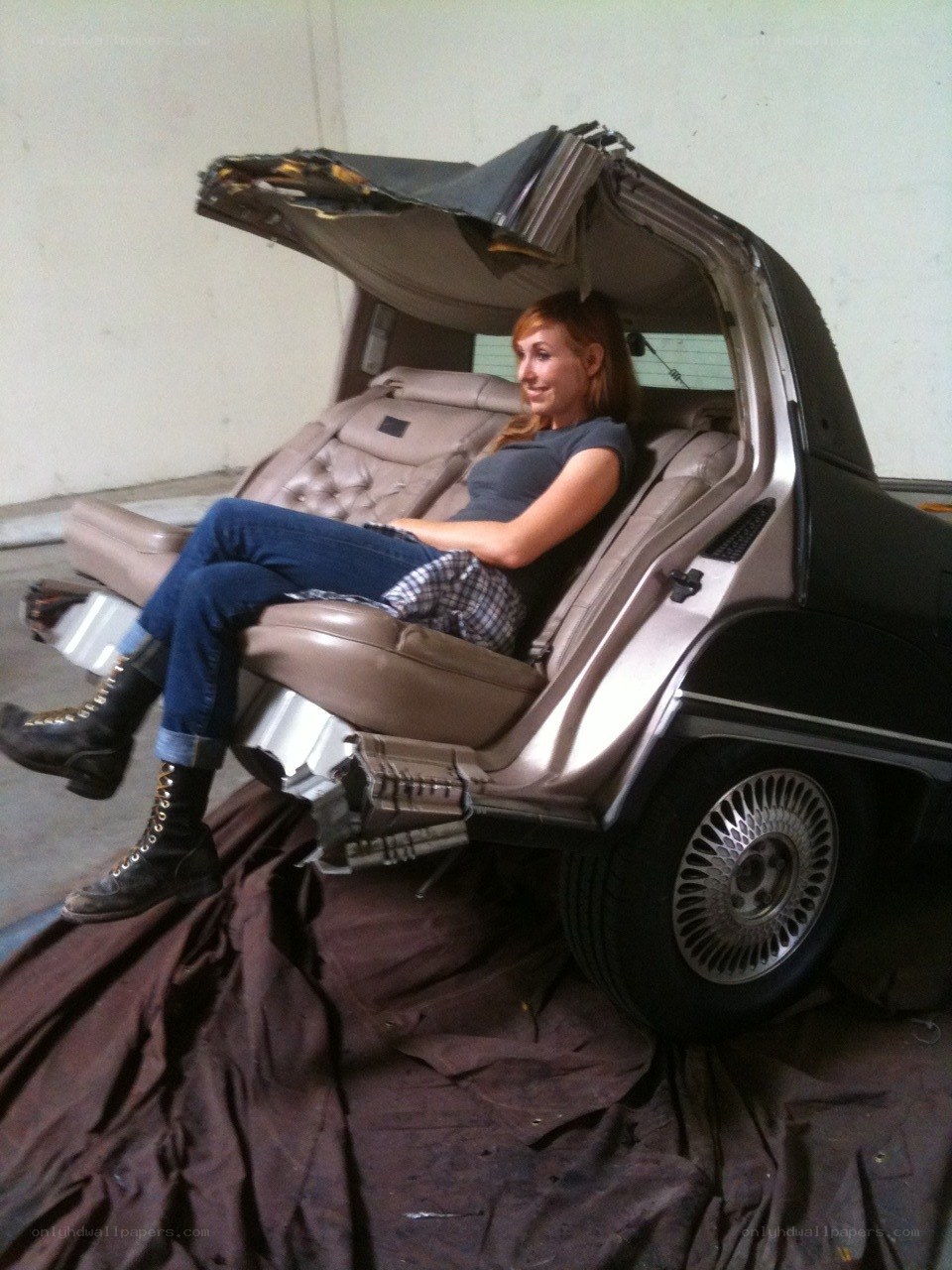 Woman in modified car interior