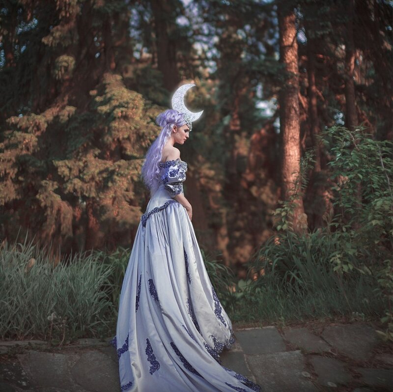 Woman in Moon-themed Dress