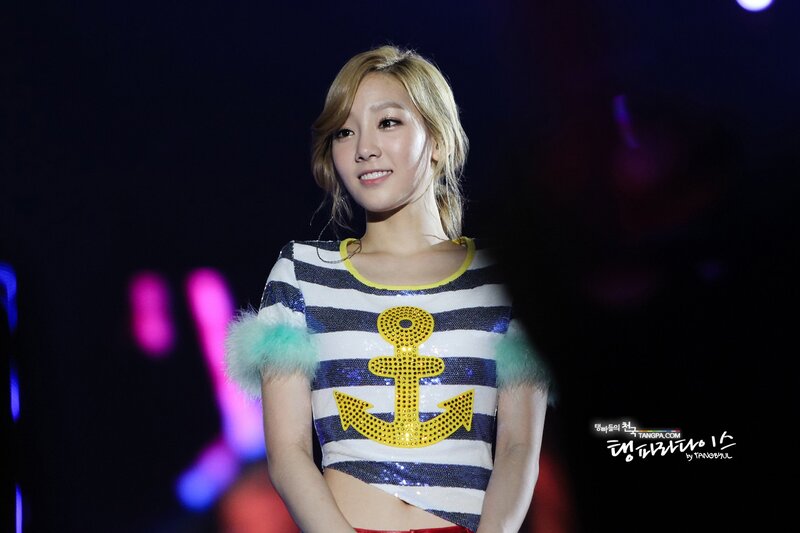 woman in nautical top on stage