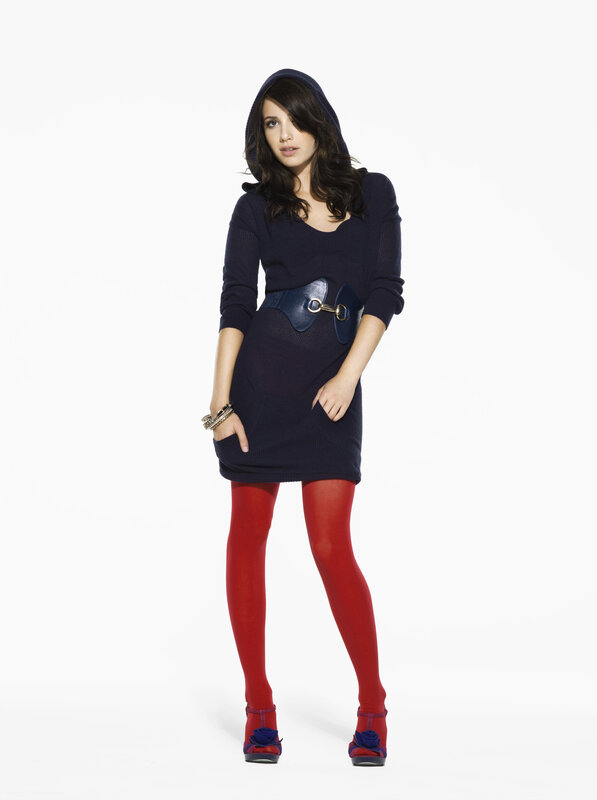 woman in navy dress and red tights