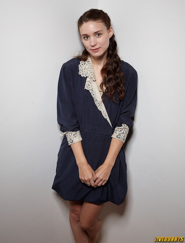 woman in navy dress with lace