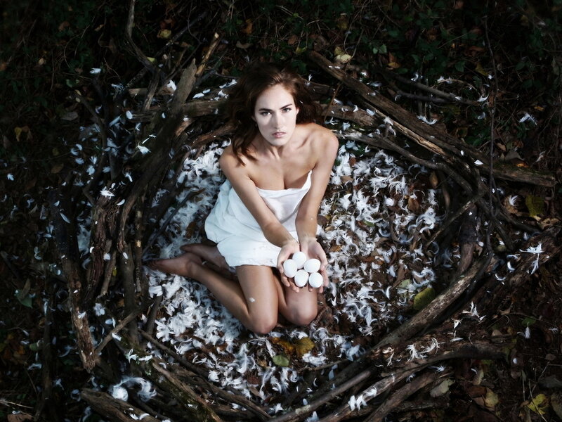 Woman in Nest with Eggs