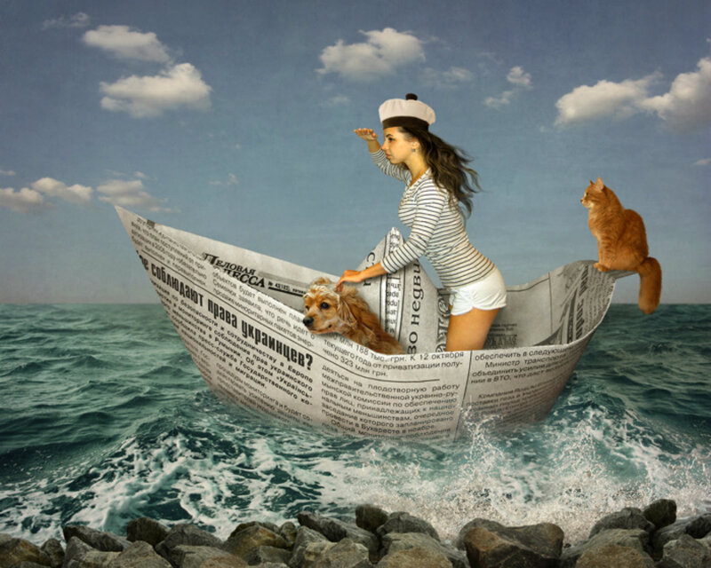 Woman in Newspaper Boat