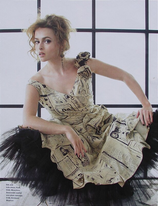 Woman in newspaper dress