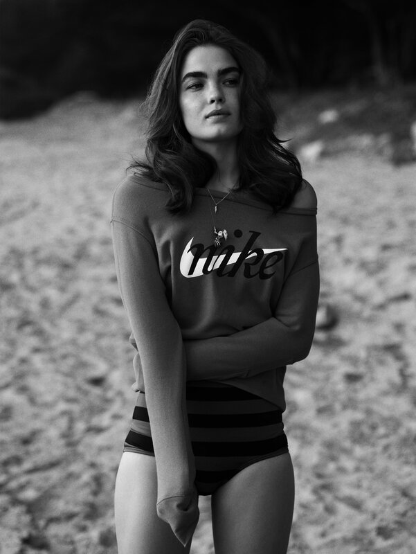 woman in nike sweatshirt