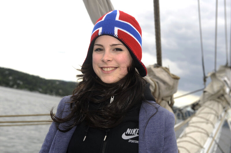 Woman in Norway hat on boat