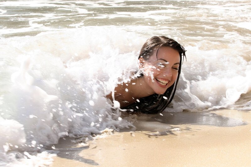 Woman in Ocean Wave — White, Playful