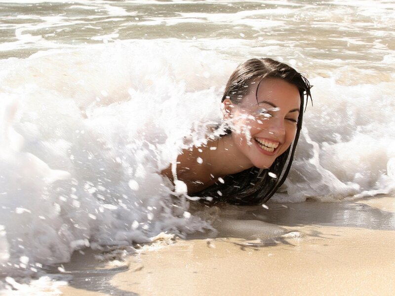 Woman in Ocean Wave — White