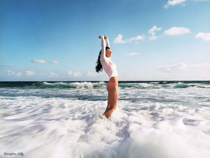 Woman in Ocean Waves — Blue, Serene, Afternoon, Photograph, Sky