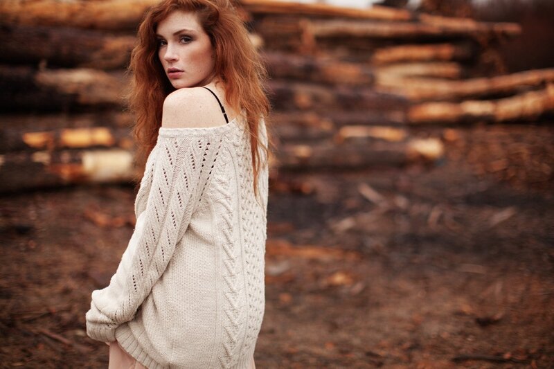 Woman in off-shoulder sweater