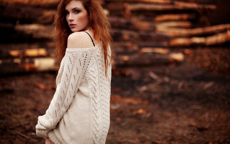 woman in off-shoulder sweater