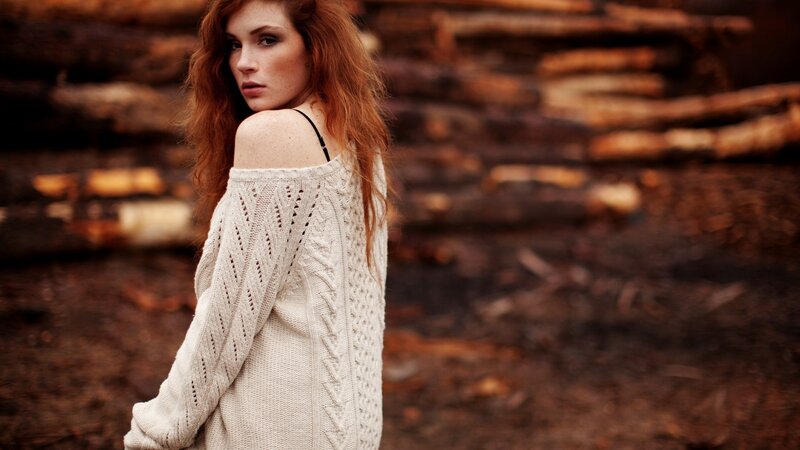 woman in off-shoulder sweater