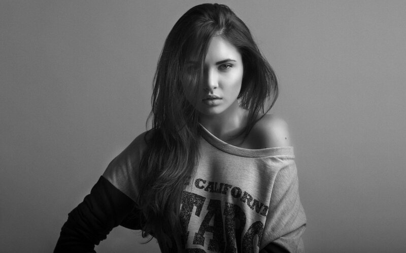 woman in off-shoulder sweatshirt