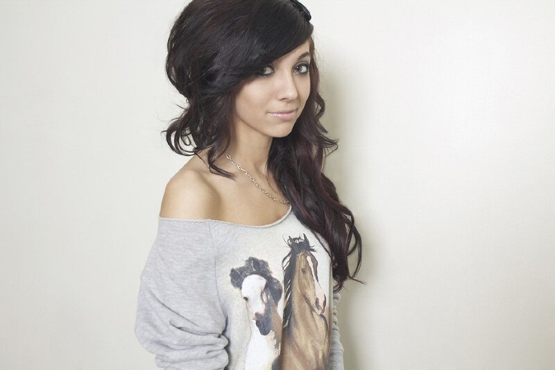 woman in off-shoulder sweatshirt