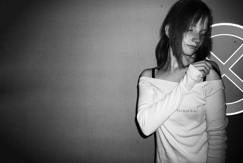 woman in off-shoulder top