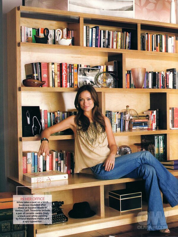 Woman in office with bookshelf