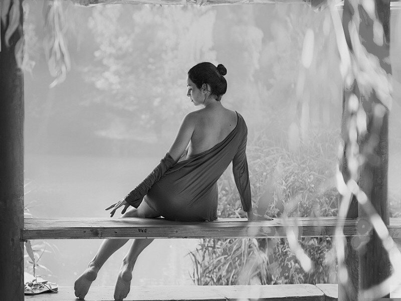 woman in one-shoulder dress