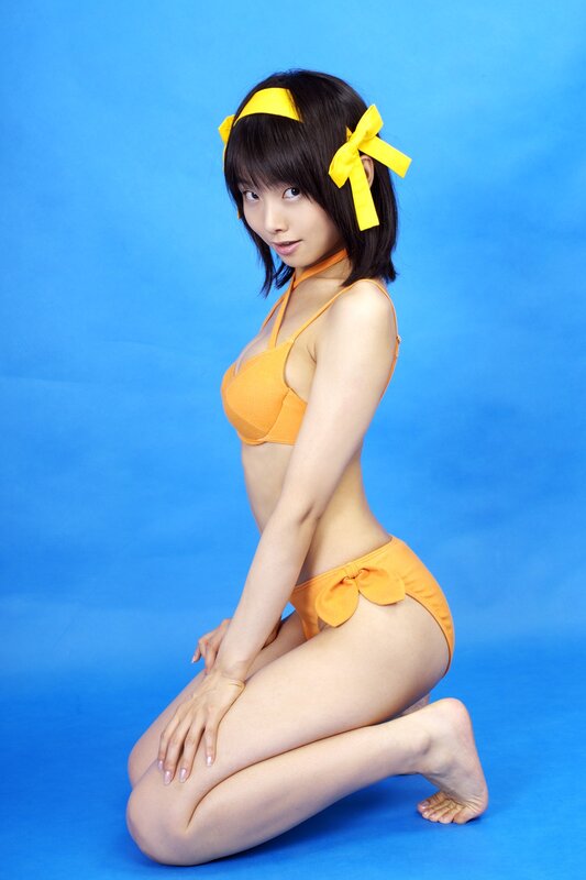 Woman in Orange Bikini — Blue, Playful, Photograph, Headband, Blue Background