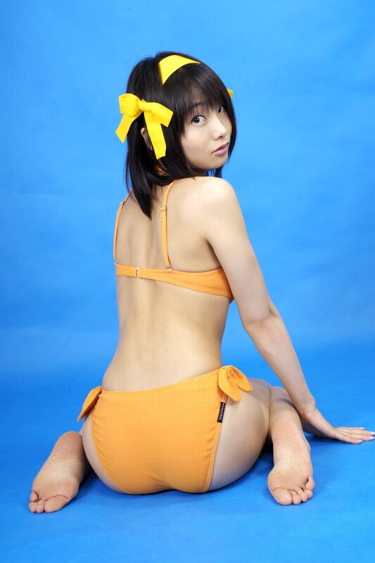 woman in orange bikini with yellow bow
