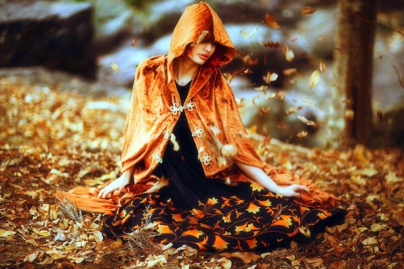Woman in Orange Cloak