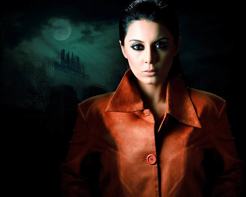 woman in orange coat at night