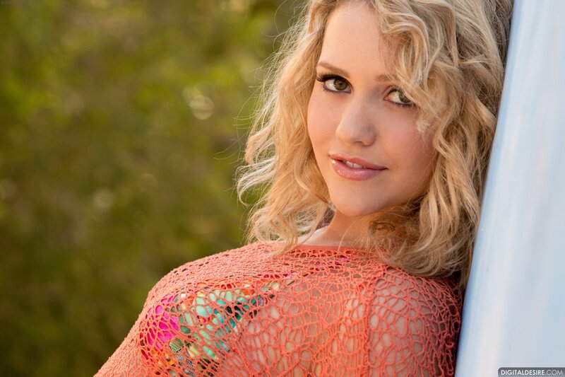 woman in orange crochet top