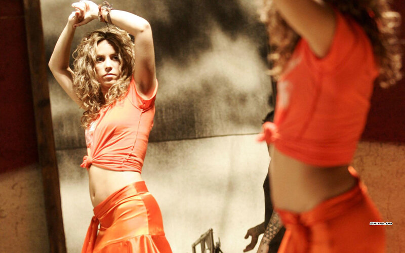 woman in orange dance outfit