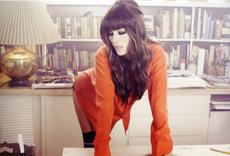 woman in orange dress