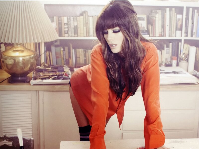 woman in orange dress
