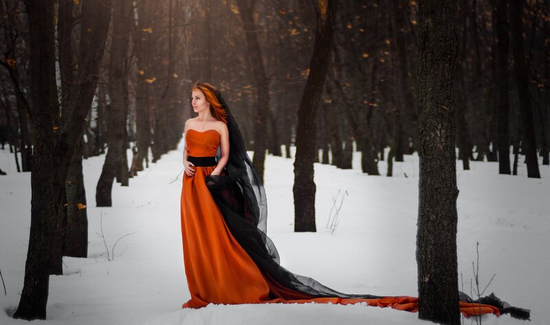 Woman in Orange Dress — Dramatic, Winter, Photograph